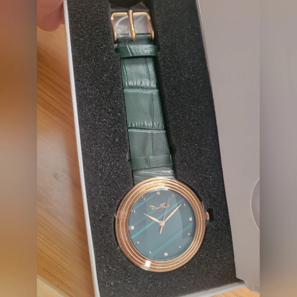 Elegant Green and Gold Watch